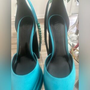 Versace women platform shoes worn once in good condition!